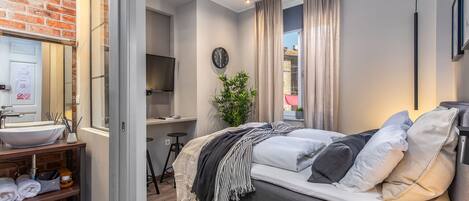 Premium bedding, memory-foam beds, in-room safe, individually decorated