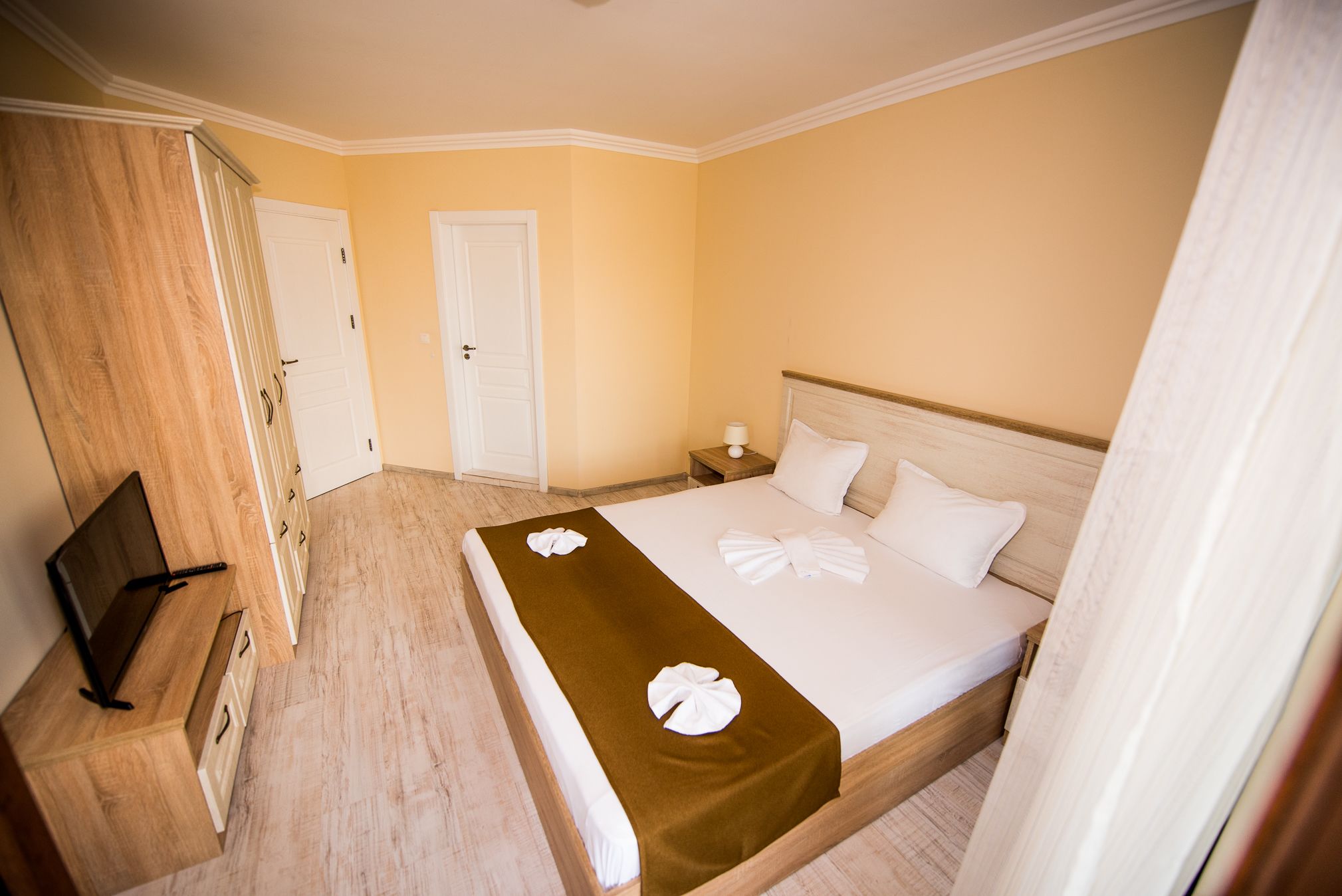 apartment, 2 bedrooms, balcony, partial sea view | soundproofing, iron/ironing board, free wifi, bed sheets