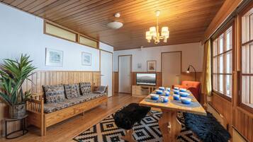 Standard Apartment, 4 Bedrooms, Non Smoking, Sauna | Living area | TV