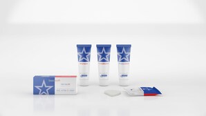 Un kit de cuidado capilar basicearth que incluye champú, acondicionador y tubos de crema corporal, además de una caja y una bolsita.