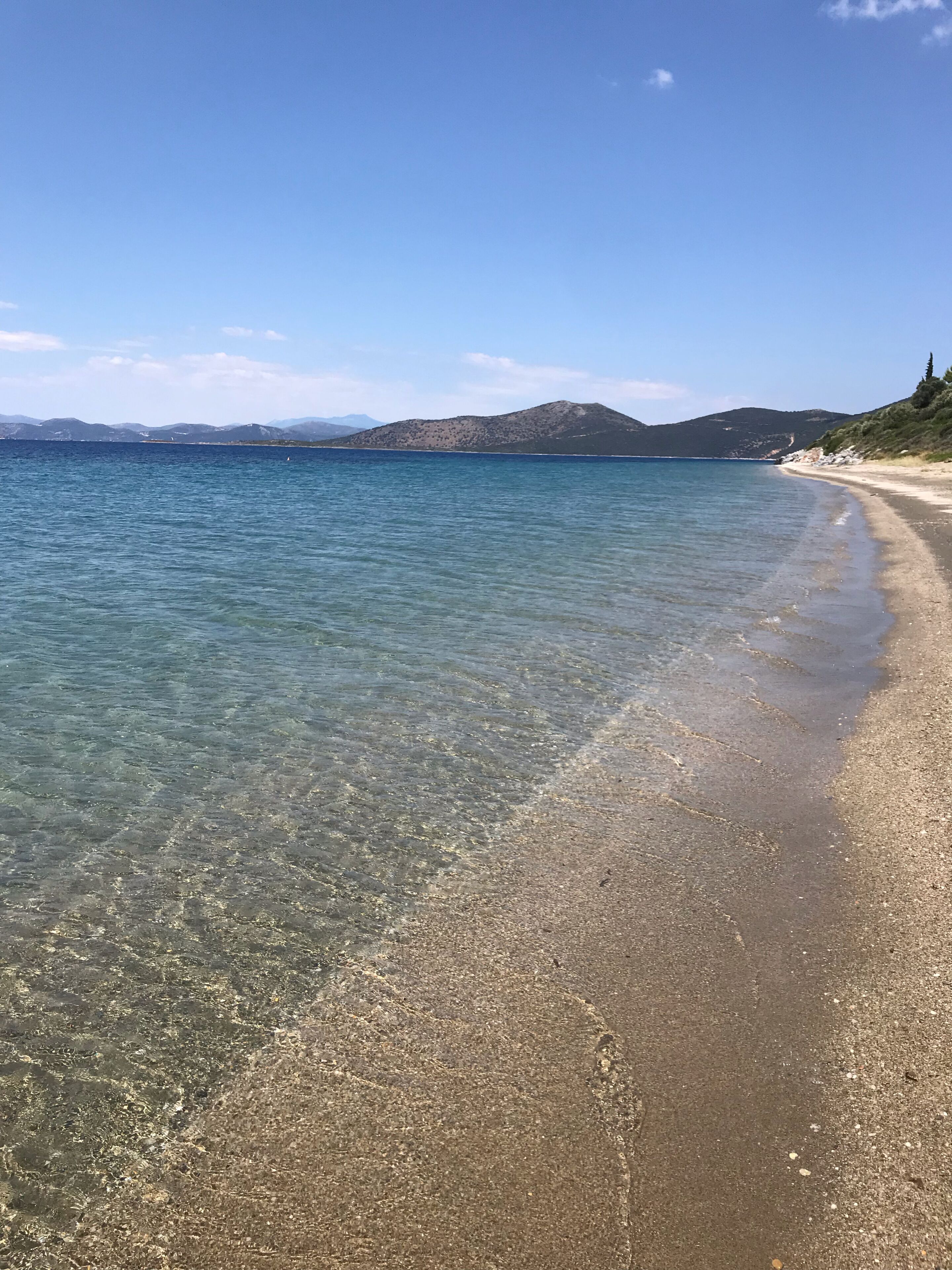 Nær stranden, solsenger og strandhåndklær