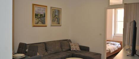 Apartment, 2 Bedrooms | Living area | Flat-screen TV