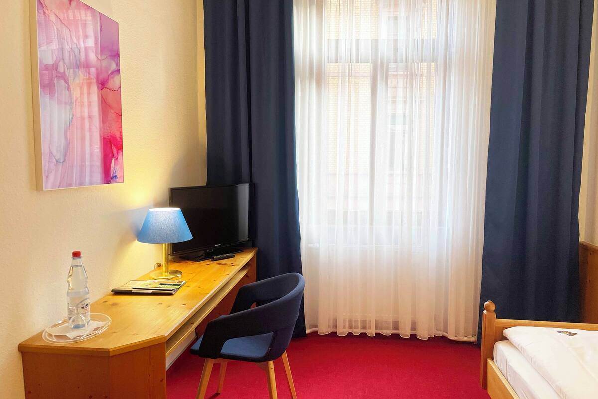 single room | in-room safe, desk, blackout curtains, iron/ironing board