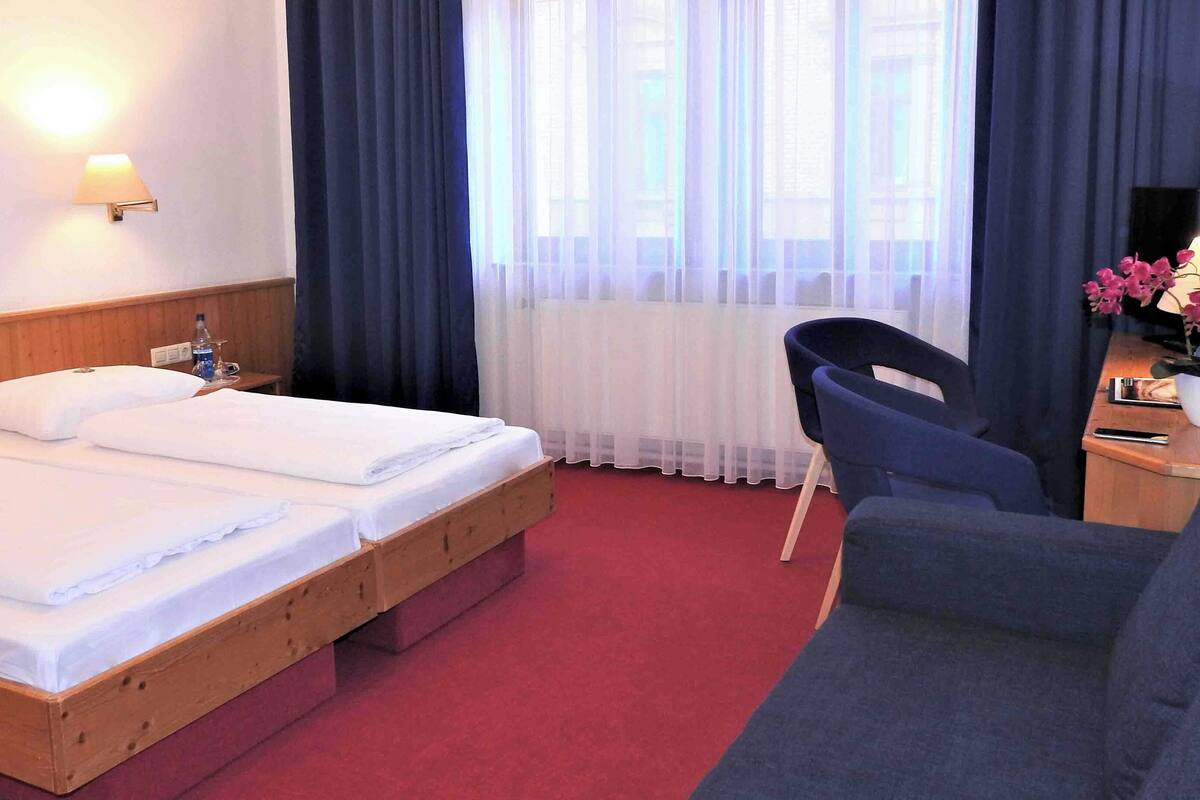 double room | in-room safe, desk, blackout curtains, iron/ironing board