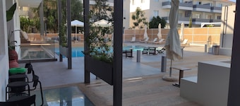 Mysig appt i en lyxig resort med 2 gemensamma pooler