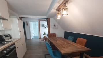 Apartamento família, banheiro privativo | Cozinha privada | Cadeirão de bebê