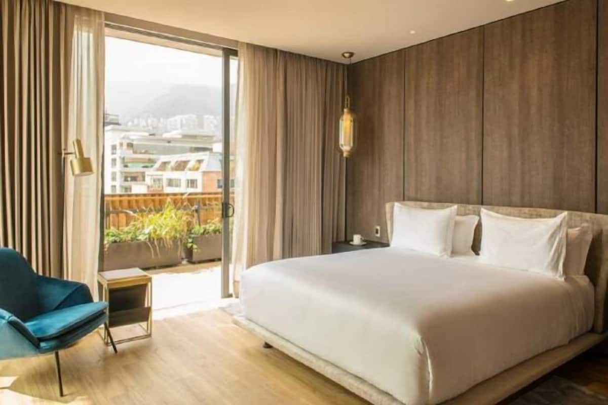 Luxe beddengoed, donzen dekbedden, pillowtop-bedden, een minibar