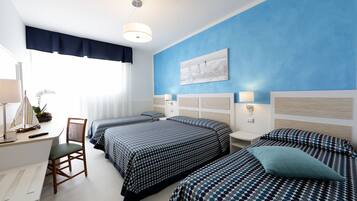 Quadruple Room | Minibar, in-room safe, desk, free WiFi