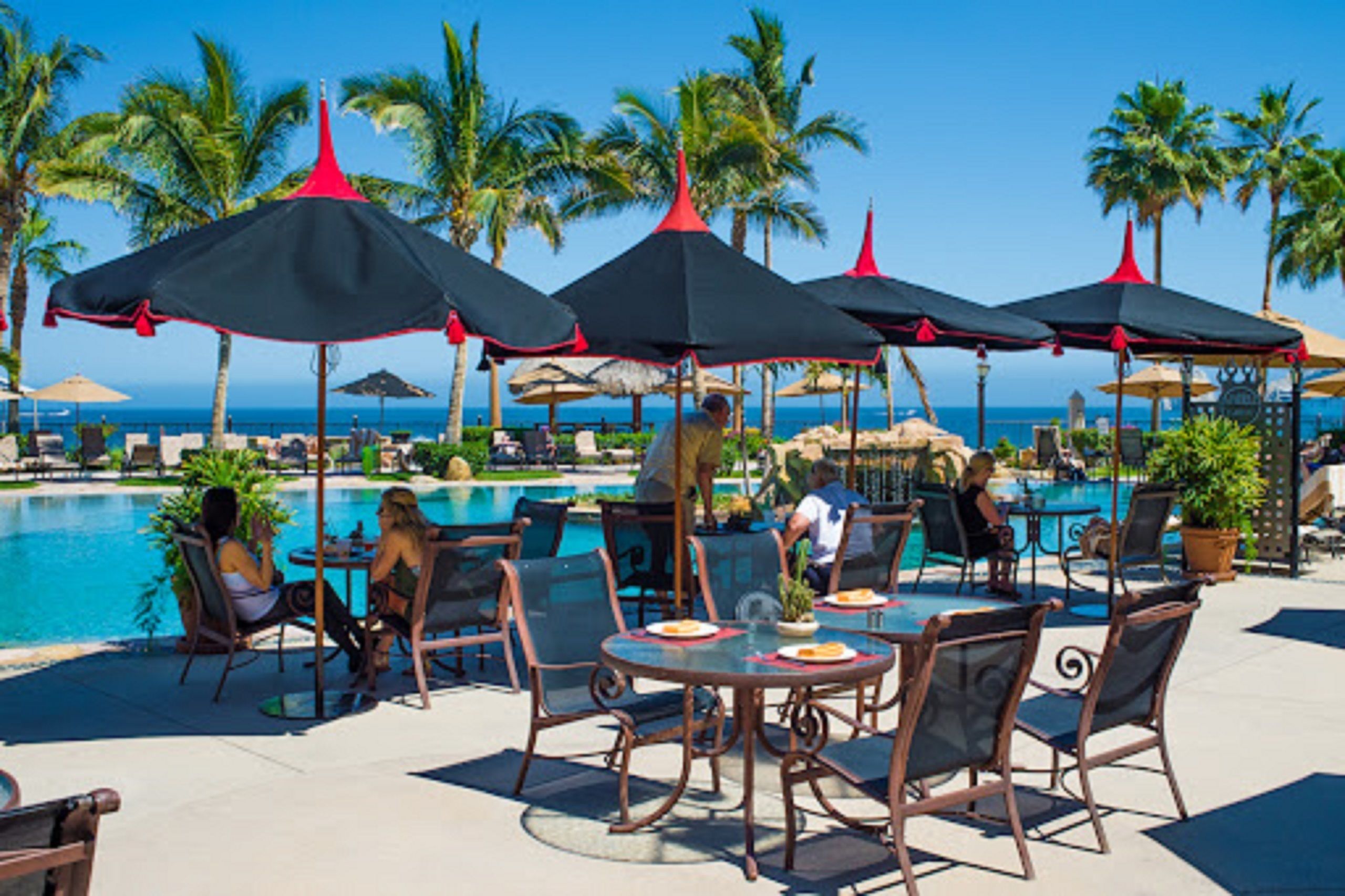 Outdoor pool, free cabanas, pool umbrellas