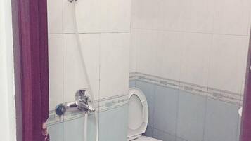Shower, slippers, towels, soap
