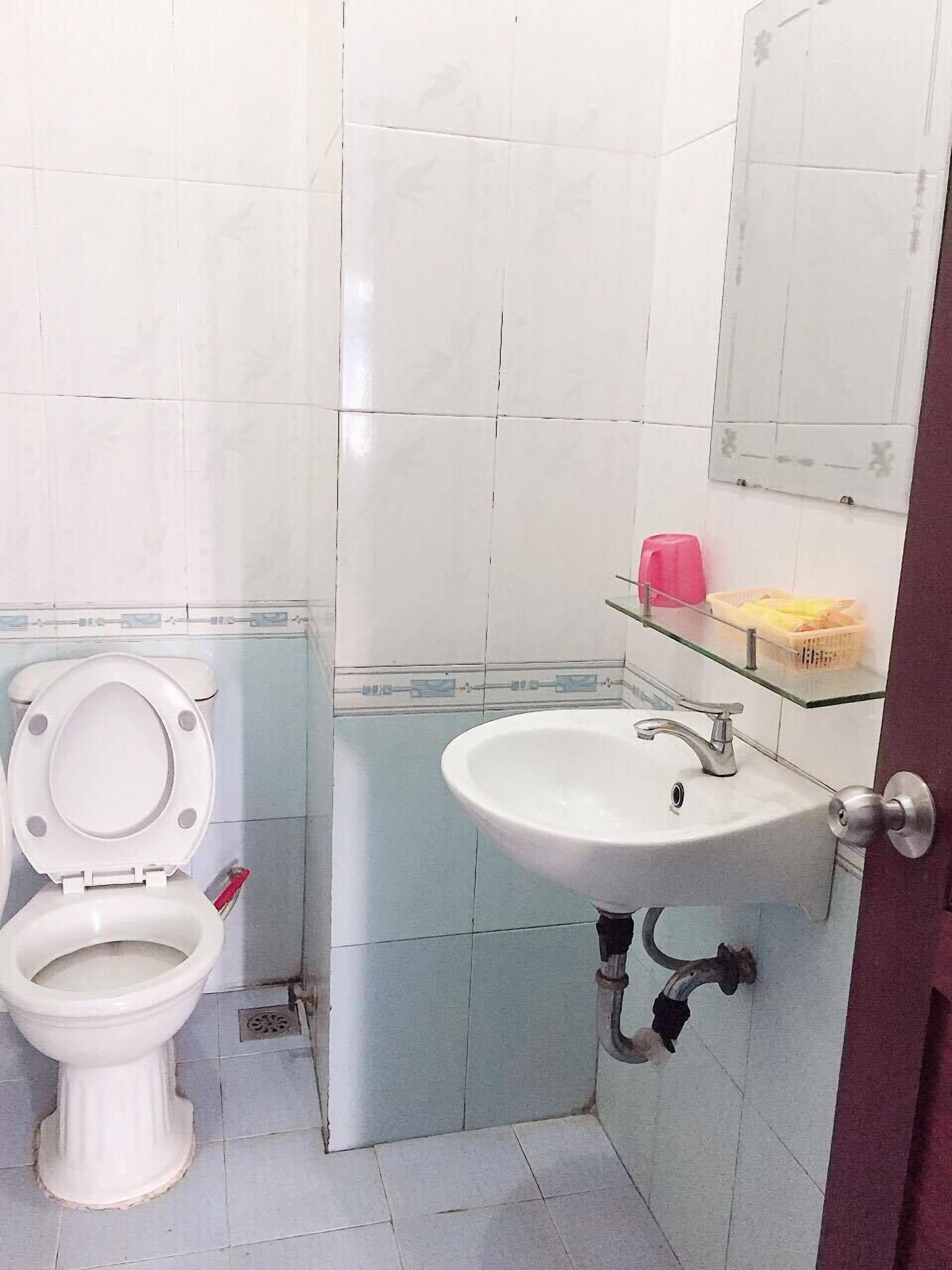 Shower, slippers, towels, soap
