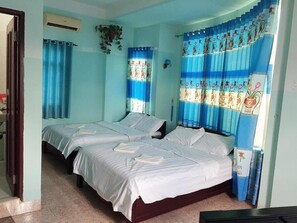 Standard Quadruple Room | Minibar, free WiFi, bed sheets