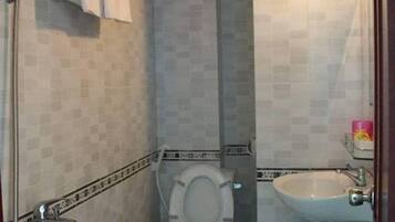 Shower, slippers, towels, soap