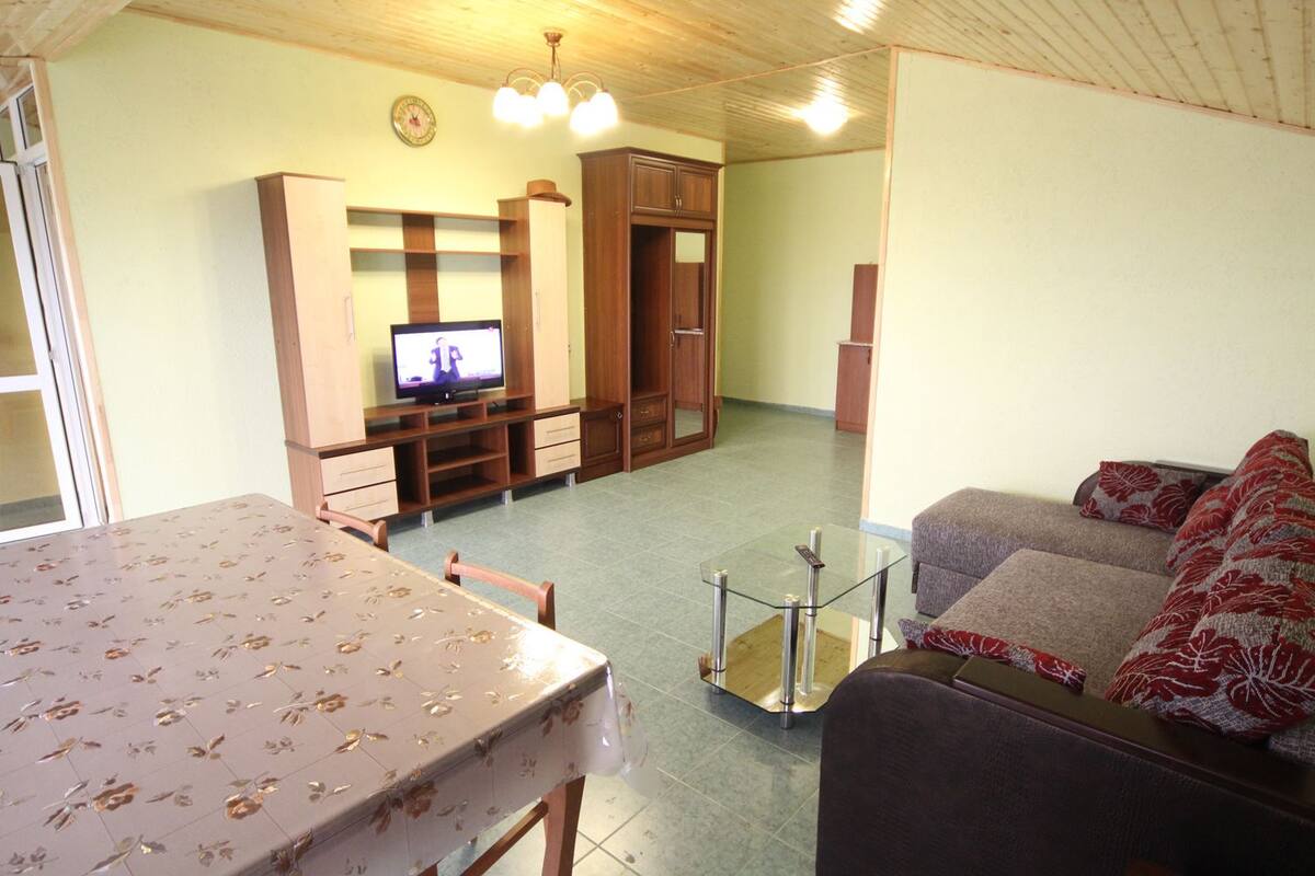 Signature-Apartment, Meerblick | Schreibtisch, laptopgeeigneter Arbeitsplatz, Verdunkelungsvorhänge