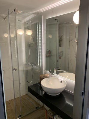 Shower, free toiletries, hair dryer, bathrobes