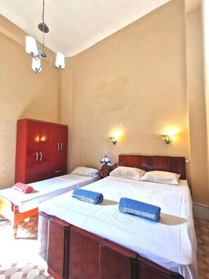 Basic Triple Room, Multiple Beds | 1 bedroom, individually decorated, individually furnished