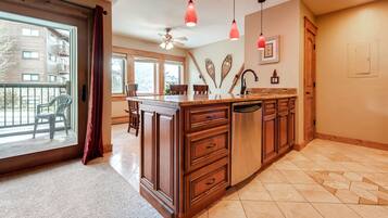 Comfort Condo, 2 Bedrooms, Kitchen (B102) | Private kitchen | Fridge, microwave, oven, stovetop