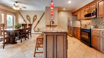 Comfort Condo, 2 Bedrooms, Kitchen (B102) | Private kitchen | Fridge, microwave, oven, stovetop