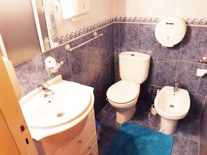 Shower, free toiletries, hair dryer, slippers