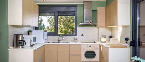 Fridge, microwave, oven, espresso maker