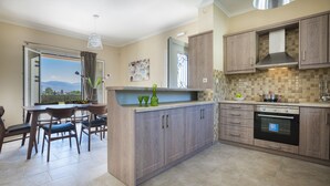 Private kitchen - Armonia Villas Kefalonia, “Beautiful location, deluxe services" (Lixouri)