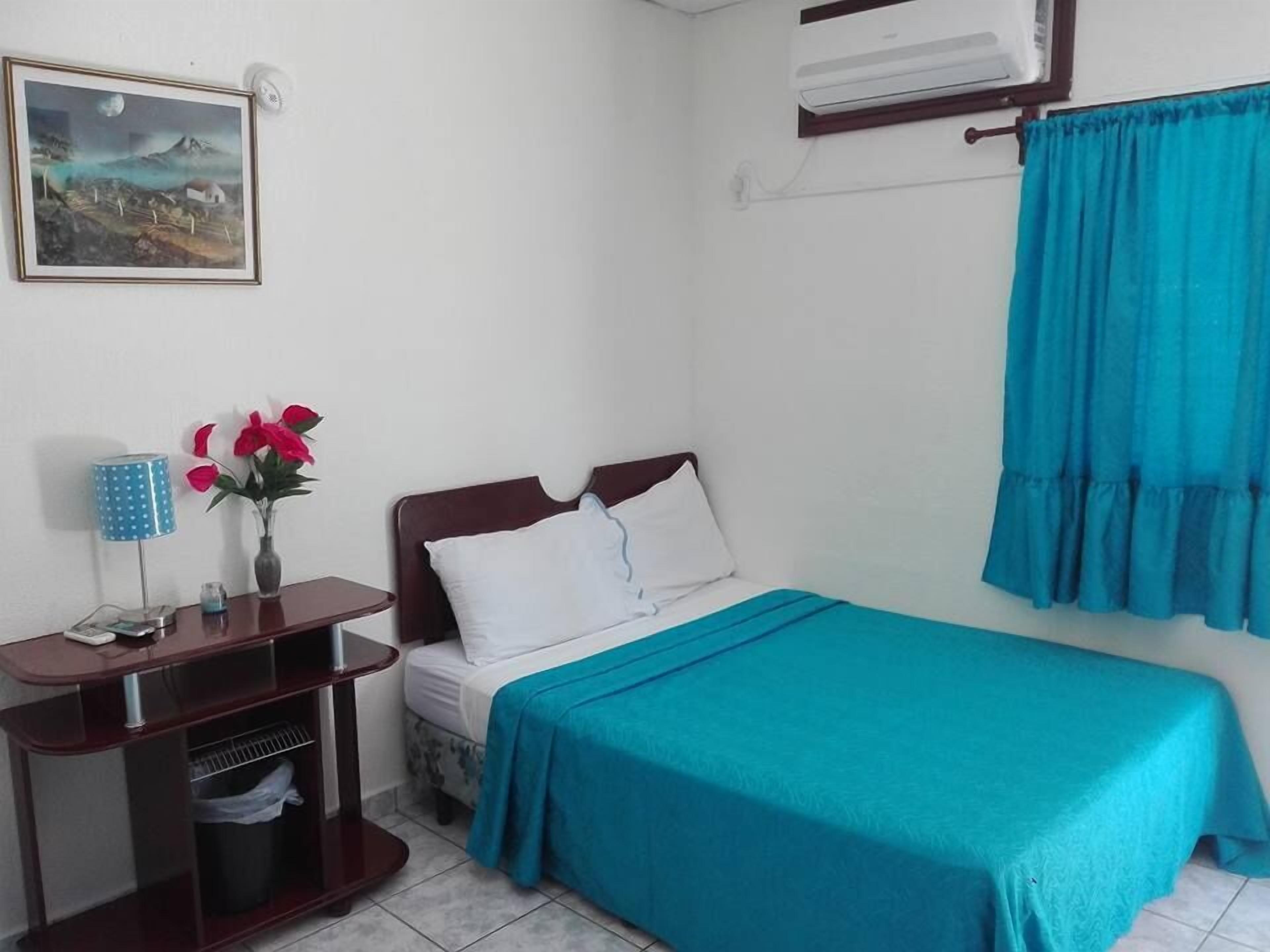 Blackout curtains, iron/ironing board, free WiFi, bed sheets