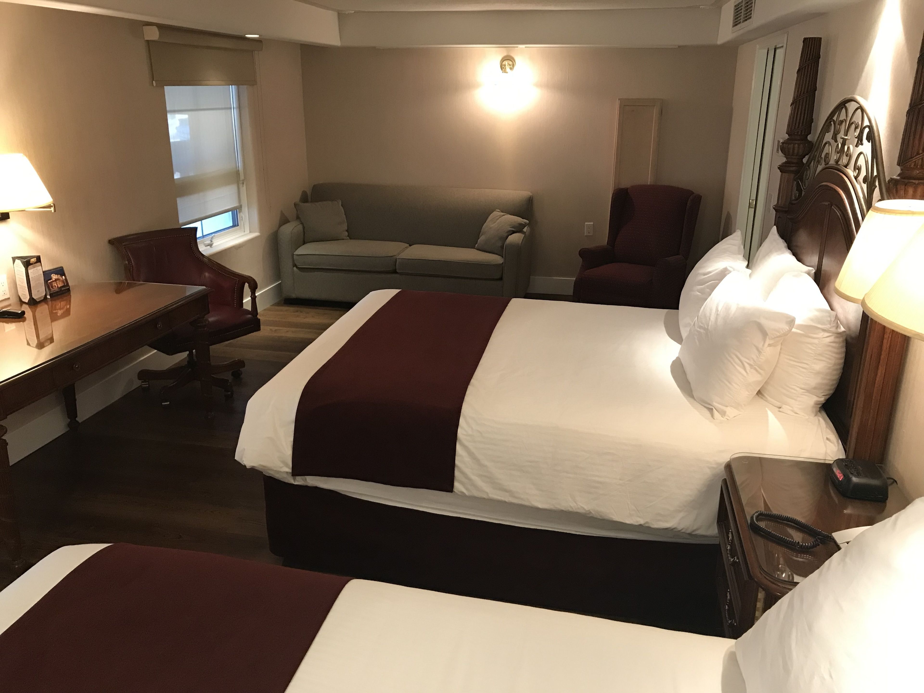 signature room, multiple beds (family) | down duvets, in-room safe, blackout curtains, iron/ironing board