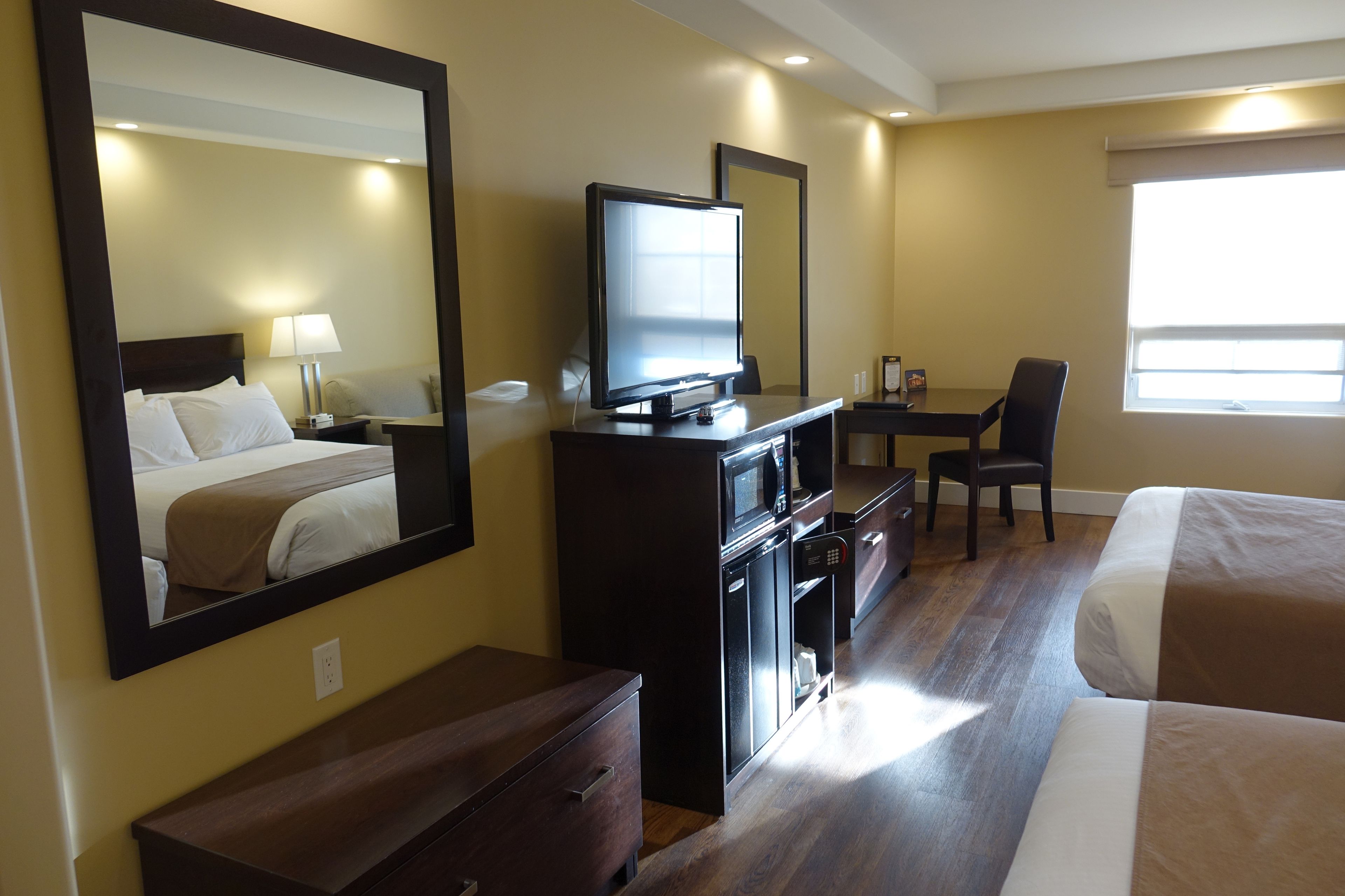 executive room, multiple beds (family) | down duvets, in-room safe, blackout curtains, iron/ironing board