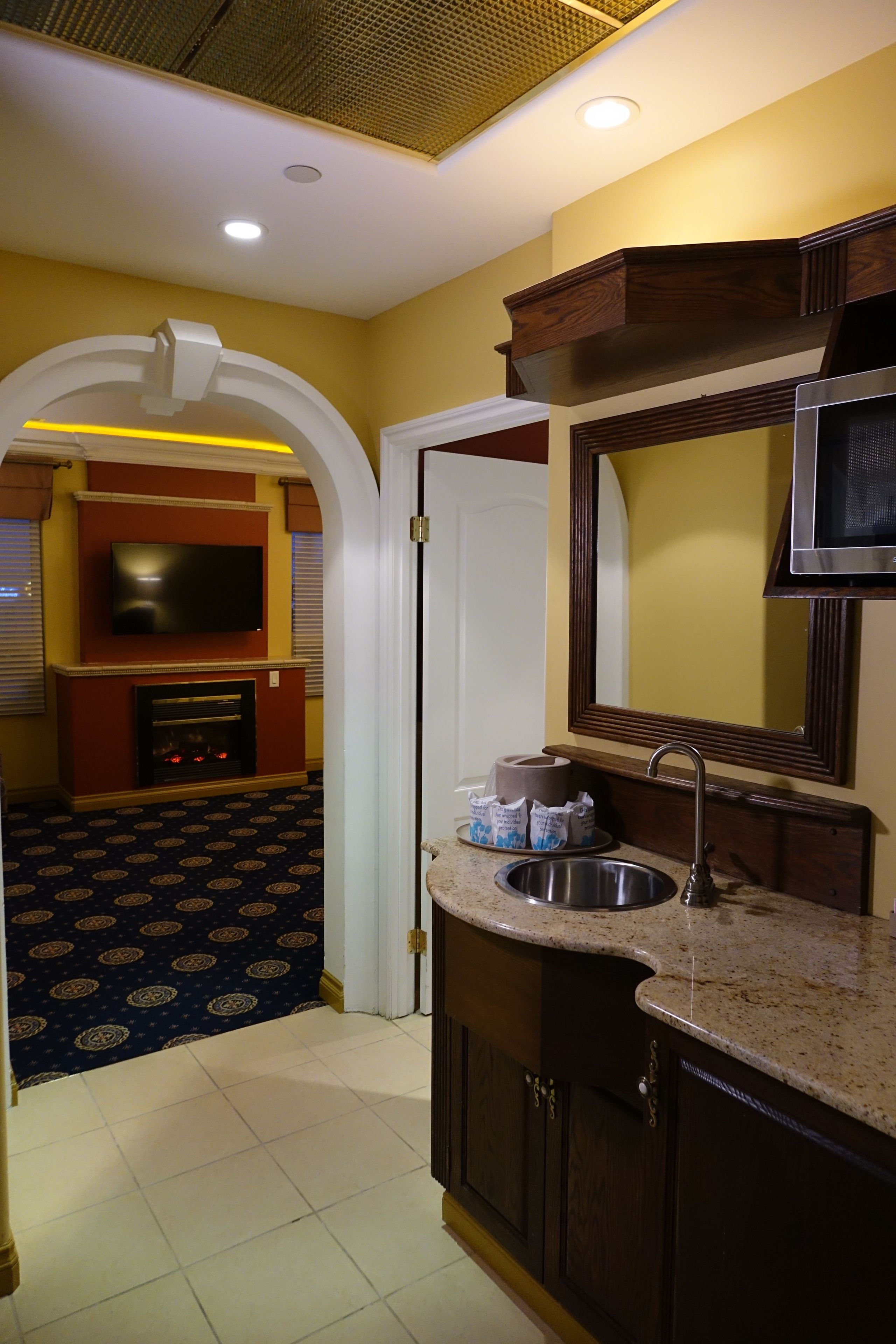 royal room, 1 king bed | down duvets, in-room safe, blackout curtains, iron/ironing board