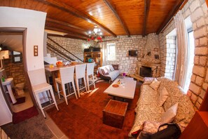 TV, fireplace, books, stereo