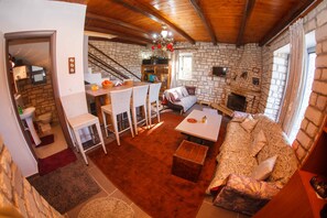 TV, fireplace, books, stereo