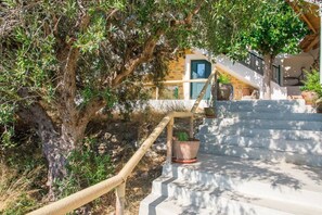 House entrance as seen from the village street. The apartment entrance is on the ground floor