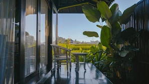 One Bedroom Pool Side Villa with Rice Field View | Living area | 32-inch LED TV with cable channels, TV - Kayangan Villa Ubud (Tegallalang)