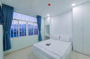 Appartement Standard, 2 chambres (Bignest) | Coffres-forts dans les chambres, bureau, fer et planche à repasser