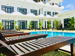 Outdoor pool, pool loungers