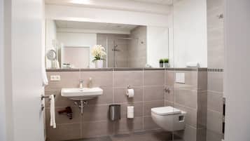 Shower, free toiletries, hair dryer, towels