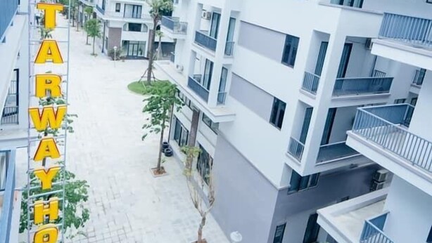A multi-story hotel with a modern design, featuring balconies and a central courtyard. - Starway Hotel (Ha Long)