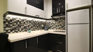 Junior Room, City View | Private kitchenette | Coffee/tea maker, fridge, microwave, electric kettle - Palm Ville Suites (Beirut)