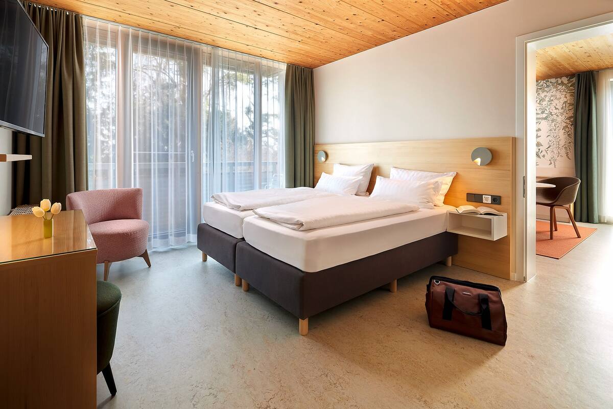 hoernle - family room (handicapped accessible) | hypo-allergenic bedding, desk, laptop workspace, blackout curtains