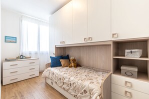 Apartment, 2 Bedrooms | Iron/ironing board, free cots/infant beds, free WiFi, bed sheets - Residence Olivastro Vista Mare (Baunei)
