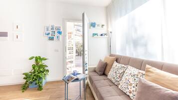 Apartemen, 2 kamar tidur | Area keluarga | TV layar datar