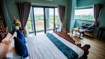 Deluxe Double Room | Minibar, desk, blackout drapes, free WiFi