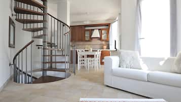 Apartemen, 2 kamar tidur | Area keluarga | TV layar datar