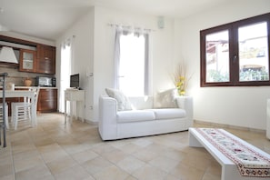Apartment, 2 Bedrooms | Living area | Flat-screen TV
