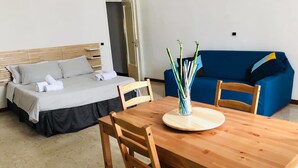 Studio, 1 Queen Bed with Sofa bed, Kitchenette (Cratere) | Living area | Flat-screen TV - Civico Vesuvio (Naples)