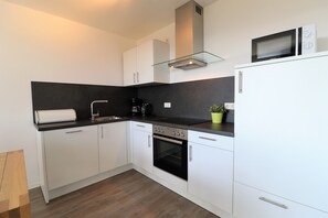 Appartement aan piste bij Winterberg 10 | Eget kjøkken | Kjøleskap, ovn, kokeplater og oppvaskmaskin