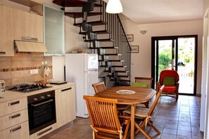 Apartment, 2 Bedrooms | Private kitchen | Fridge, oven, stovetop, cookware/dishes/utensils - Residence Bianco Navarrese C (Baunei)