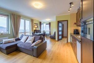 Apartment, 1 Bedroom | Living area | Flat-screen TV