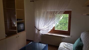 Economy Apartment, 1 Bedroom | Living area | TV