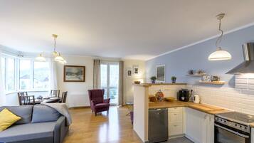 Apartemen | Area keluarga | TV layar datar